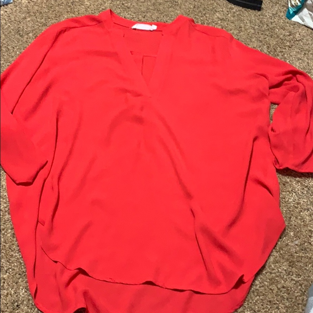 Bright orange lush blouse